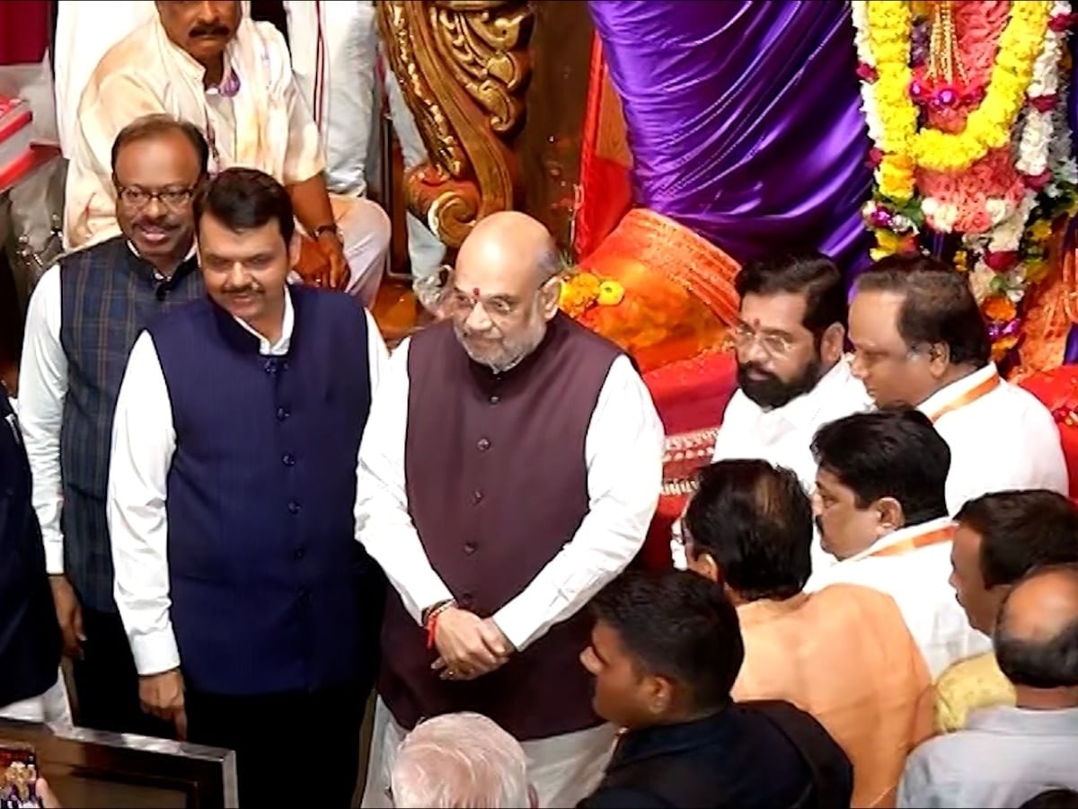 अमित शाह के इर्द गिर्द घूमता रहा अनजान सख्स, महाराष्ट्र सरकार की बड़ी लापरवाही, पढ़े...